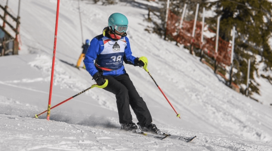 woman skiing down a hill