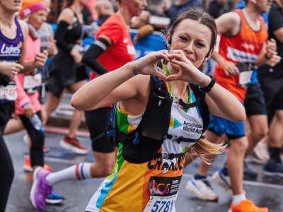 London Marathon runner making heart sign with hands